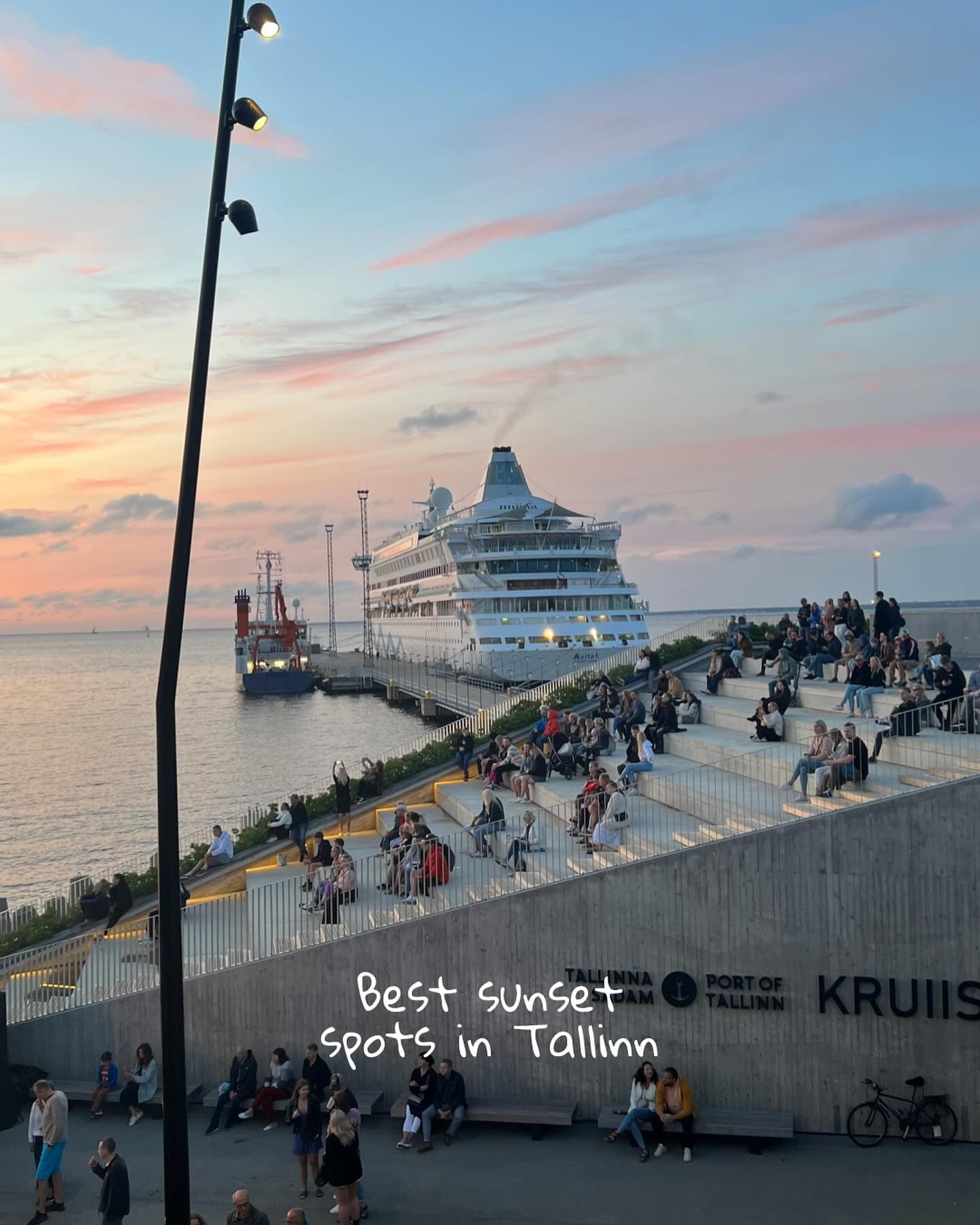 A cruise ship at sunset by the Tallinn harbour viewing steps